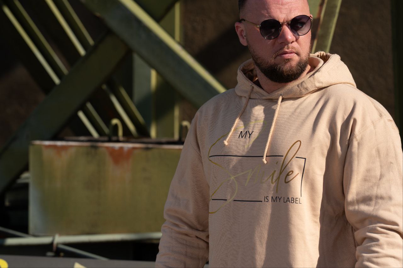 Männer Hoodie "My Smile Is My Label"